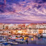 1MOCKUPS_0032_9974264_ciutadella-menorca-marina-port-sunset-with-boats_AOAY2017